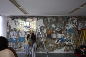 Restauração de painel de Gilda Reis resgata trajetórias femininas na arte